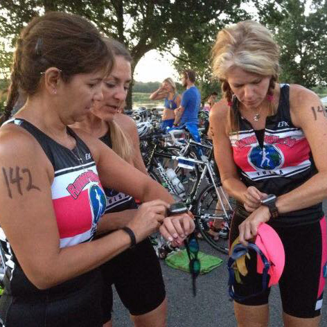 Three triathletes learn how to use new watches at the start line